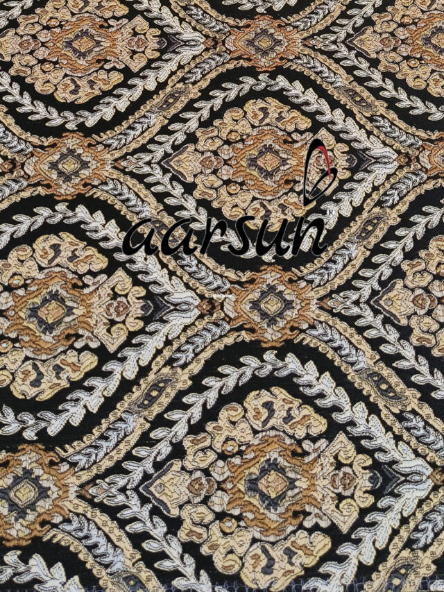 Black-and-gold-fabric-with-a-floral-pattern-for-furniture