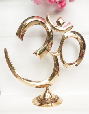 Minimalist Mandir With Single Brass Om Symbol For A Peaceful Uncluttered Ambiance 315x400 design