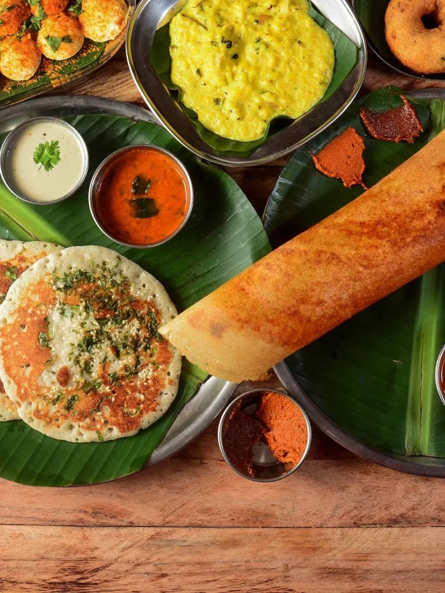 assorted-south-indian-breakfast-foods-on-wooden-background-ghee-dosa--uttappam-medhu-vada-pongal-po-203358326-1x1